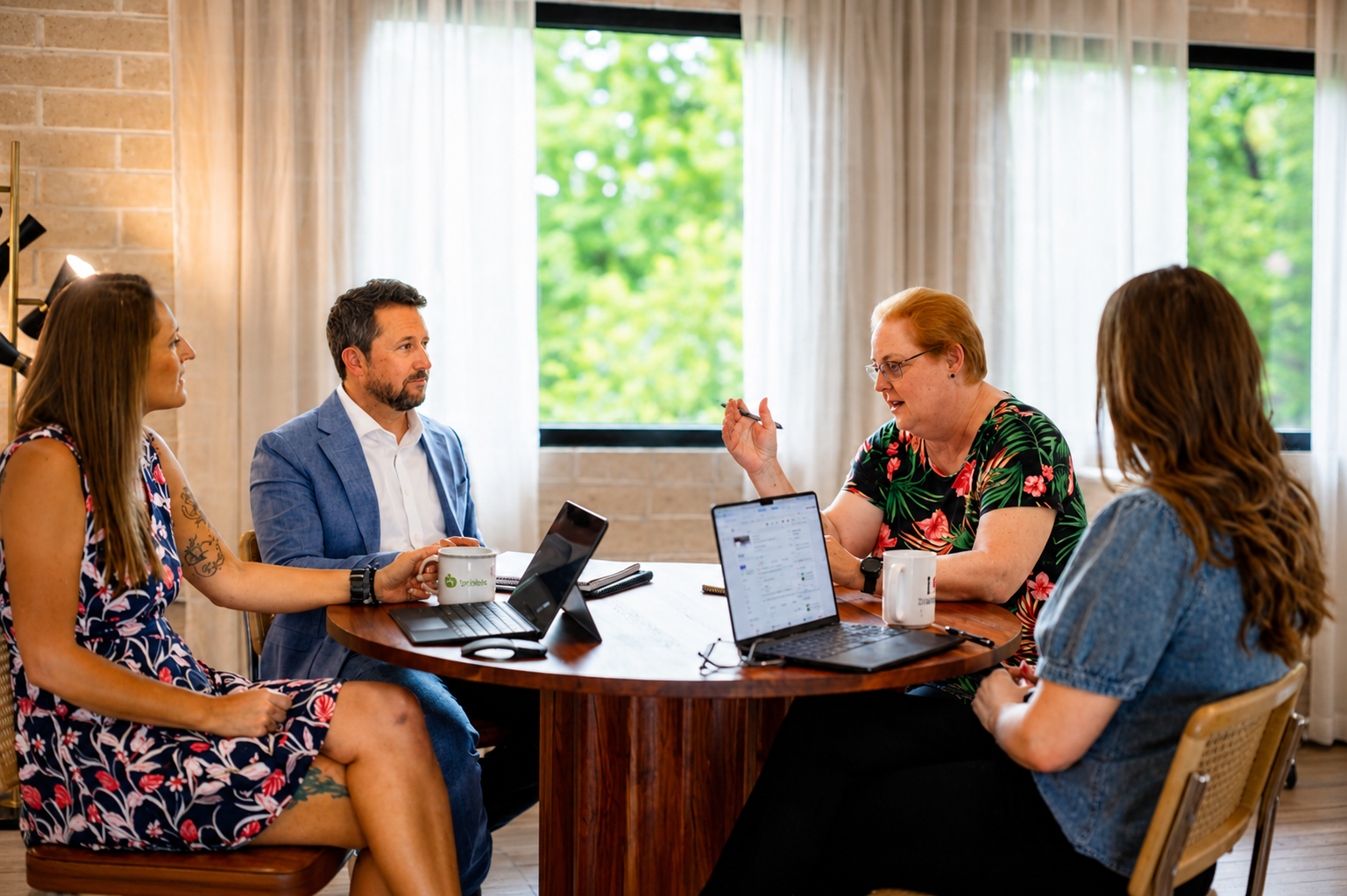 Pharma team in boardroom discussion